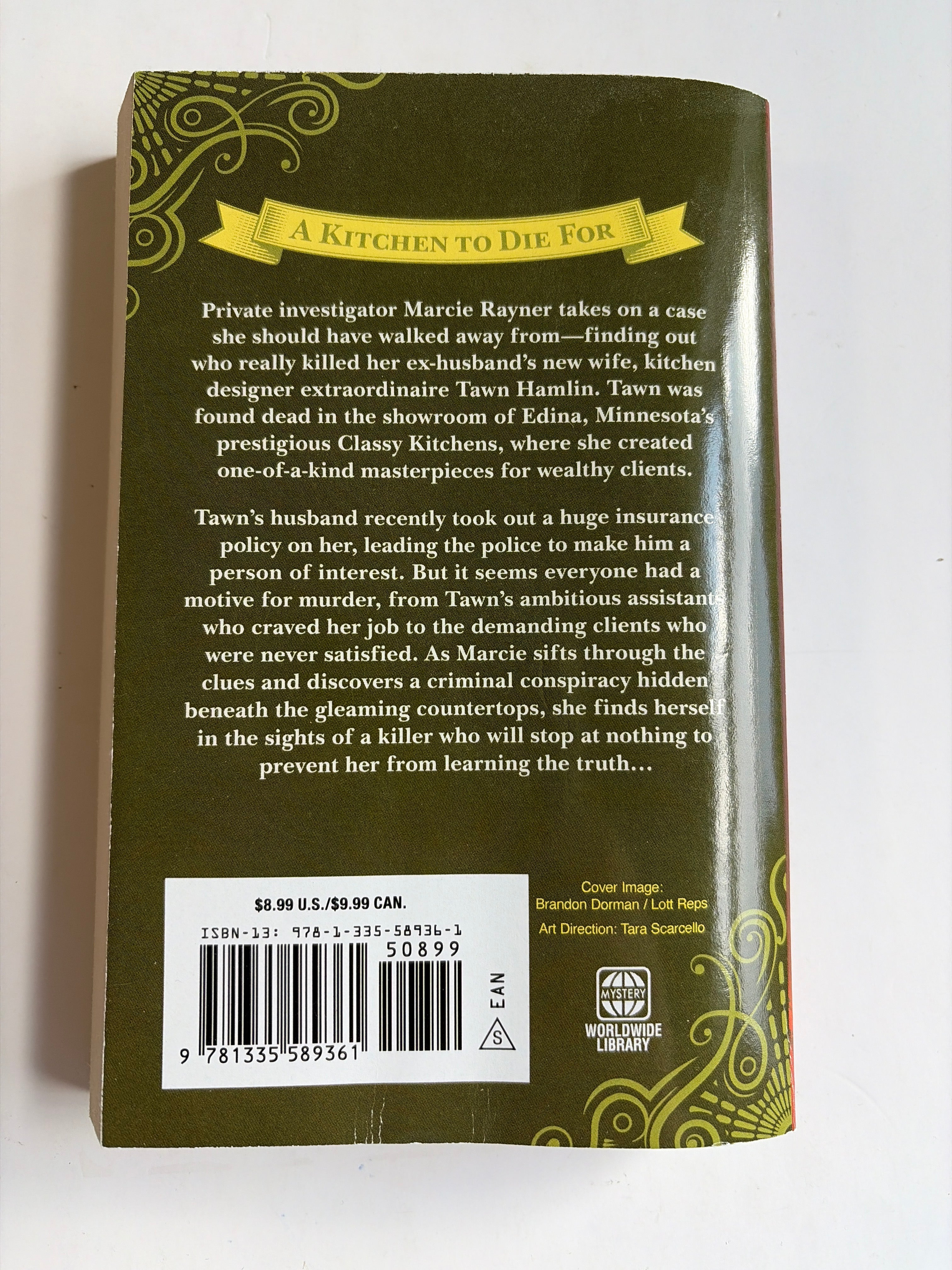 Murder at Classy Kitchens by J.C. Eaton