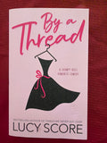 By a Thread by Lucy Score